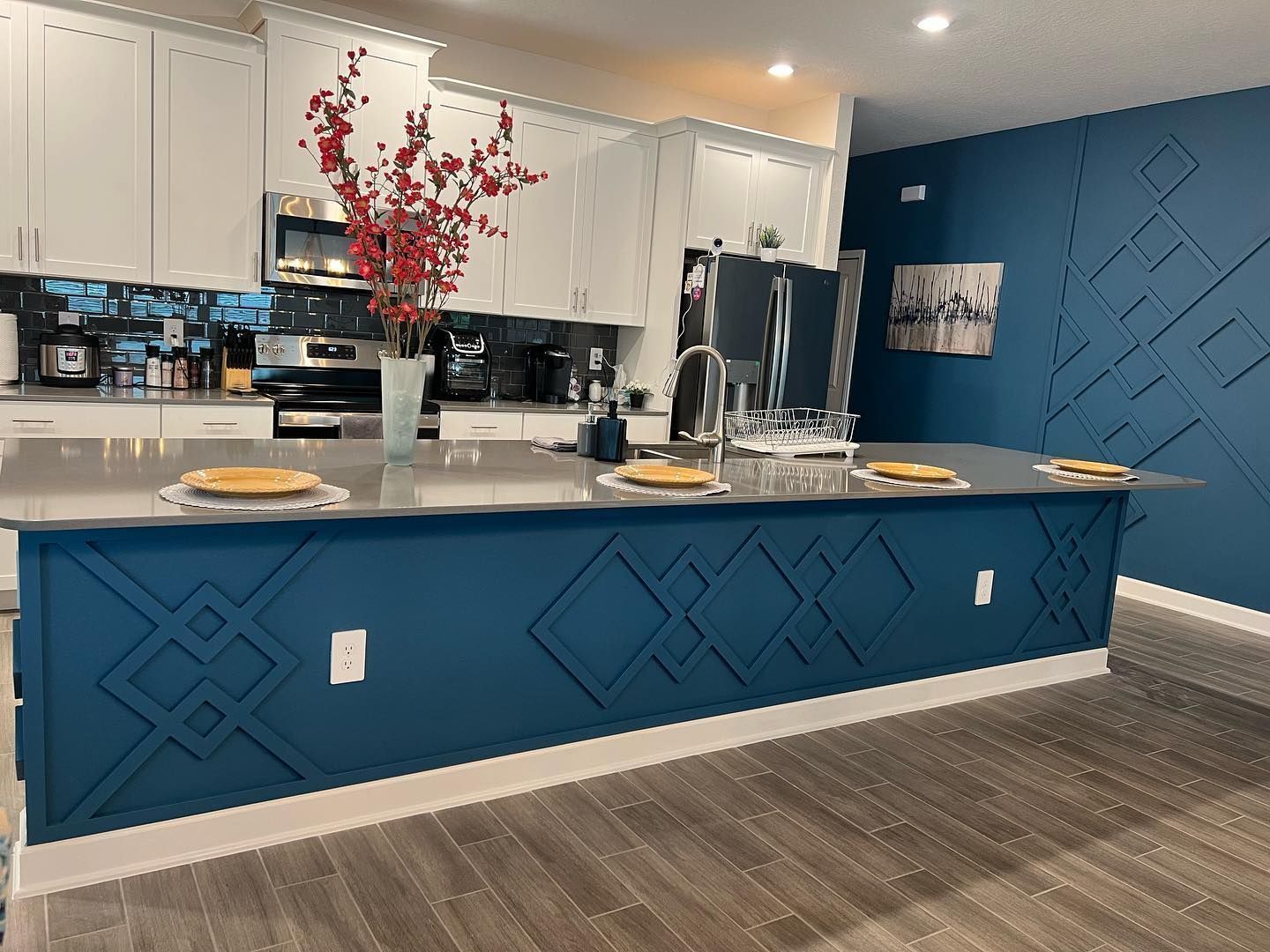 Navy panel wall with kitchen