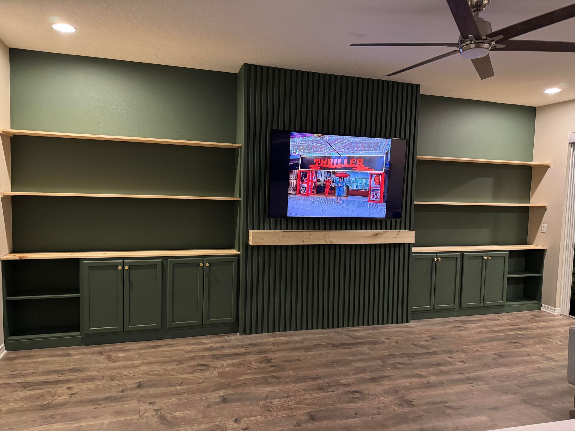 Wood slat accent wall with TV